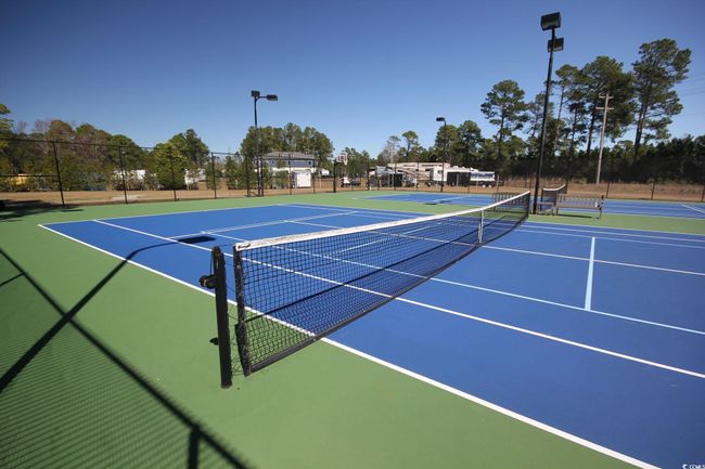 View of tennis court featuring basketball court | Image 5