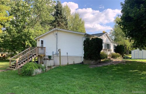 310 E Orchard St, Perry, MI, 48872-8129 | Card Image
