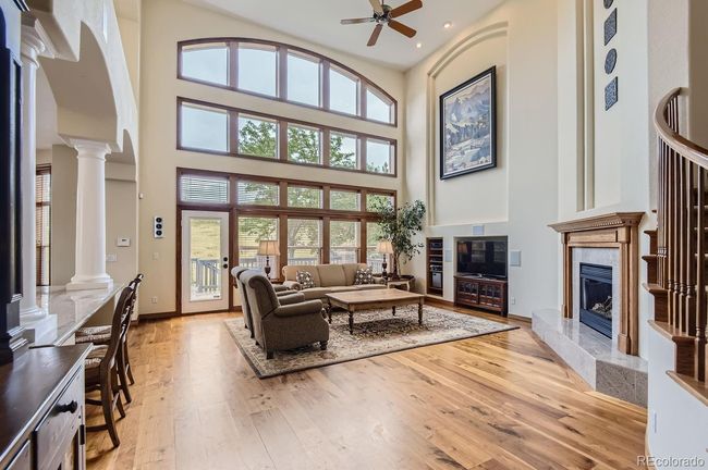 Two-story wall of windows looking out to the Bluffs Regional Park and the Lone Tree golf course! | Image 14