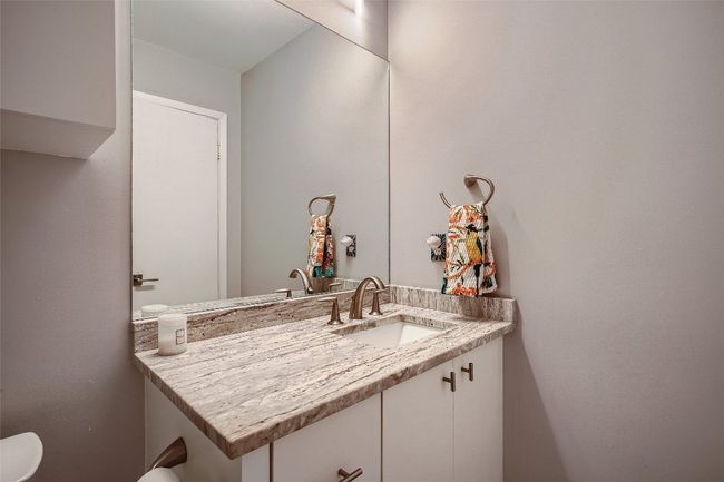 Half bathroom with vanity | Image 9
