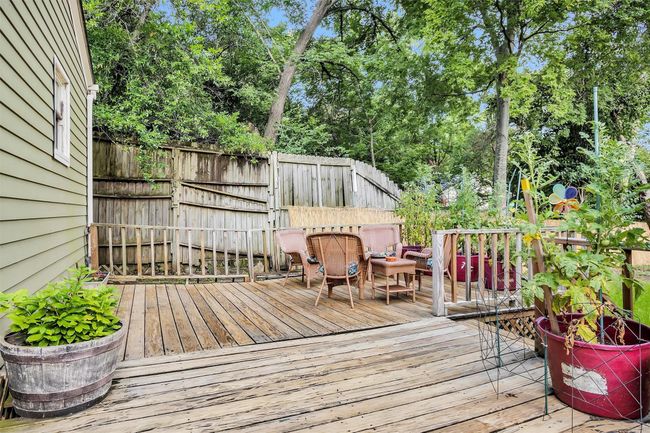 The large deck allows for additional seating. | Image 28