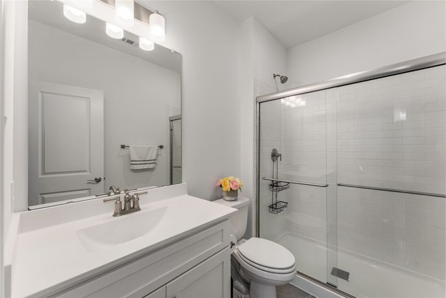 Full bathroom featuring a stall shower and vanity | Image 17