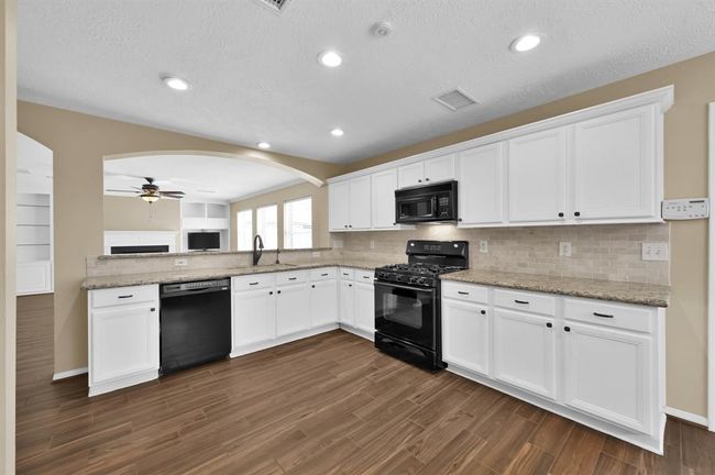 KITCHEN OPEN TO LIVING ROOM | Image 14