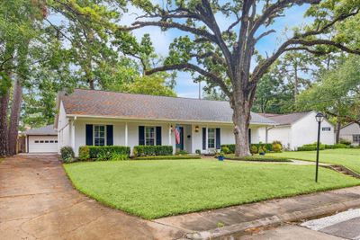 A wooded lot with great curb appeal on the coveted north side of Briargrove Park | Image 2