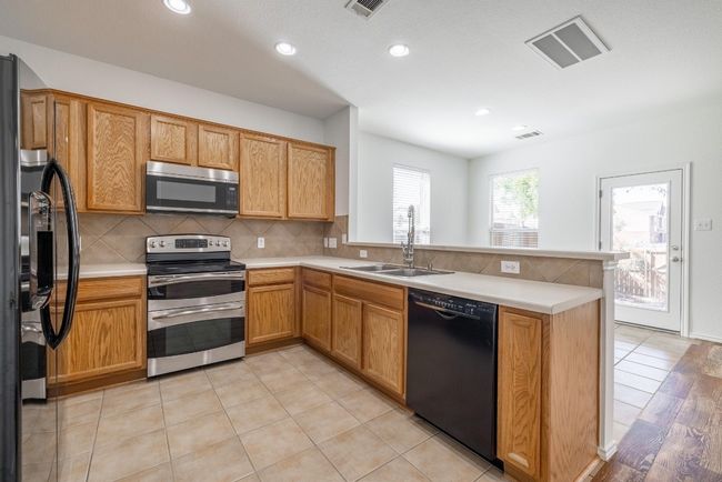 GE Side-by-Side Dishwasher w/Water & Ice Conveys | Image 10