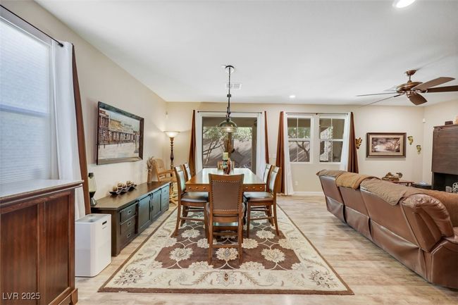 Dining space featuring visible vents, light wood-style flooring, recessed lighting, and a ceiling fan | Image 21