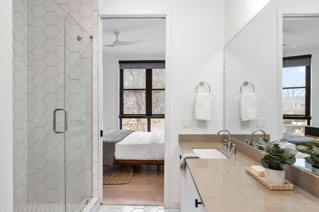 Main bathroom with double vanity sinks, walk-in shower, and huge walk-in closet | Image 28