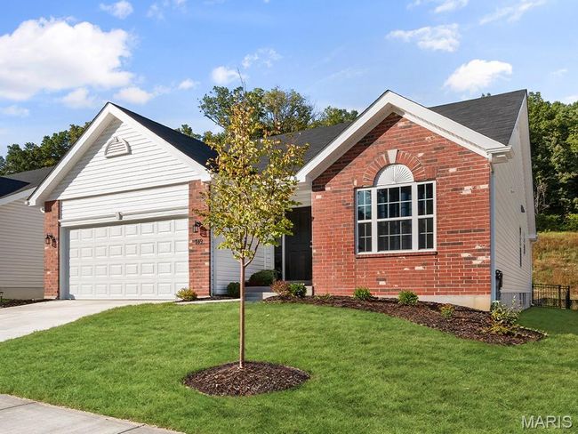 Ranch-style home with brick siding, concrete driveway, a front lawn, and an attached garage | Image 24