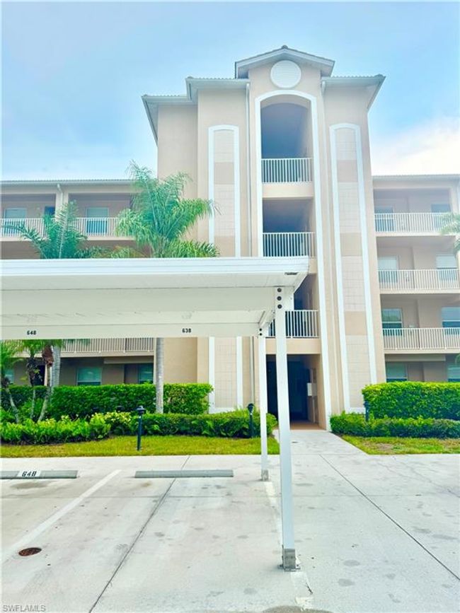 View of property featuring covered parking | Image 26