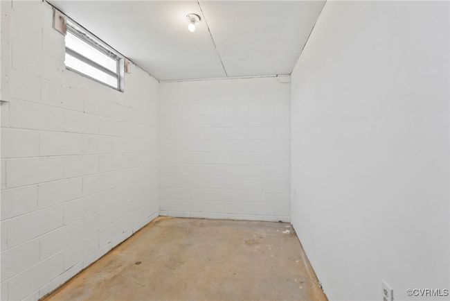 Basement featuring concrete block wall | Image 27