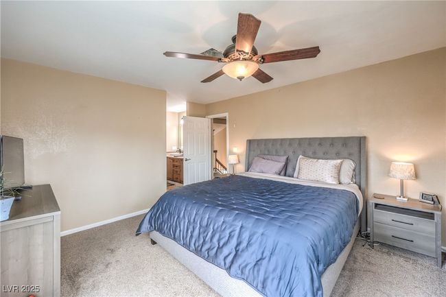 Bedroom featuring baseboards, carpet floors, and ceiling fan | Image 27