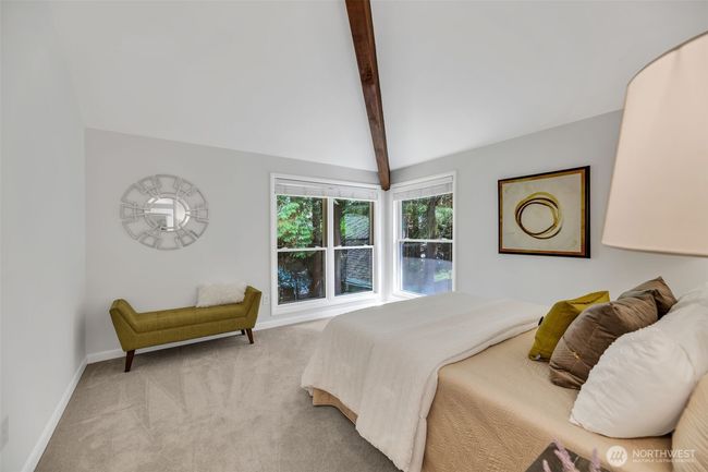 Primary suite bedroom has lots of light and great view of the wooded backyard - so private | Image 19