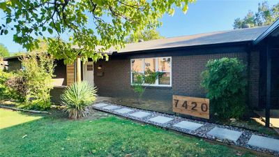 View of front facade with a front yard | Image 2