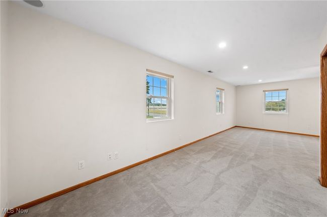 Unfurnished room with light colored carpet | Image 19