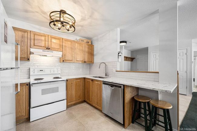 313 - 1320 Henry Rd, Condo with 3 bedrooms, 2 bathrooms and 1 parking in Courtenay BC | Image 11