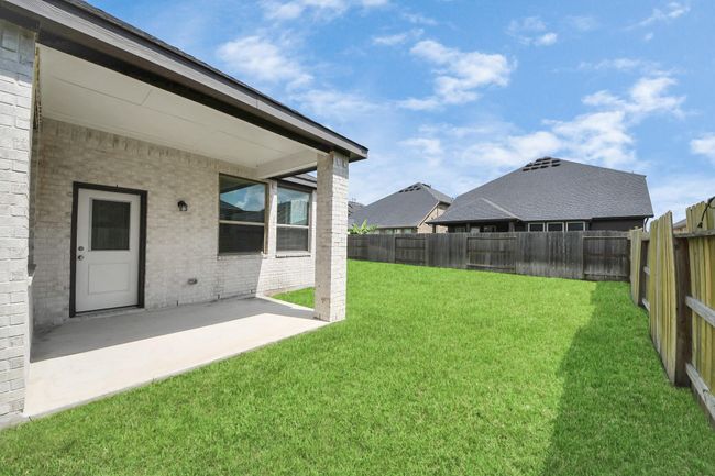 Covered patio perfect for outdoor dining and entertaining | Image 39