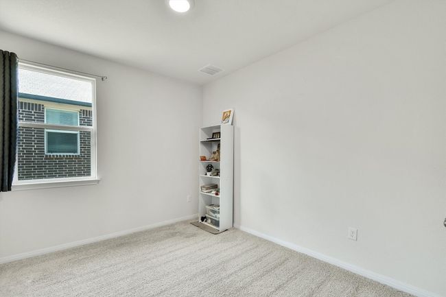 Unfurnished room featuring carpet floors and baseboards | Image 21