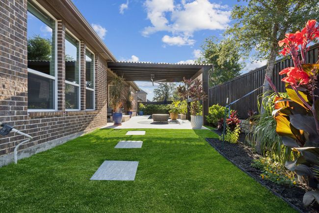 Fenced backyard featuring a patio | Image 30