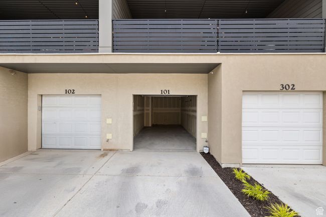 Garage featuring driveway | Image 27