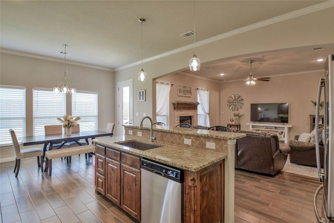 Kitchen with dishwasher, large sink, open floor plan. | Image 12