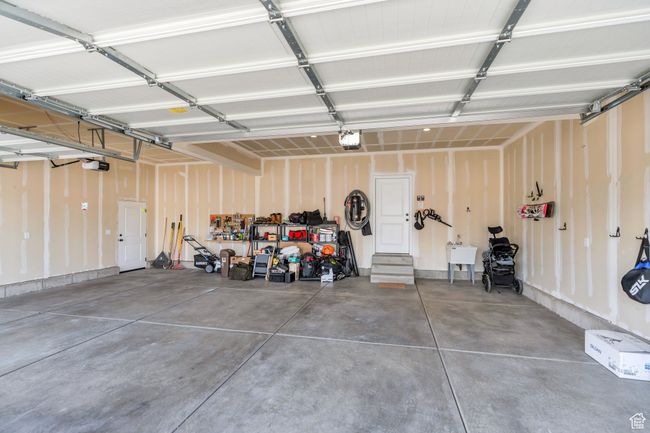 Garage featuring a garage door opener | Image 28