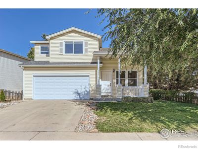 1202 Fall River Circle, House other with 4 bedrooms, 2 bathrooms and 2 parking in Longmont CO | Image 2