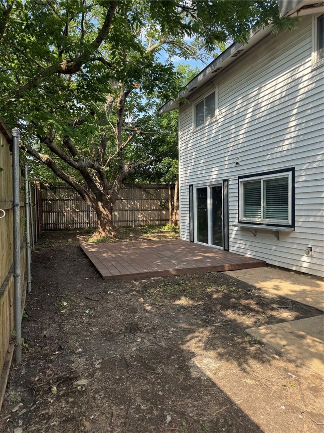 Fenced backyard featuring a patio area | Image 17