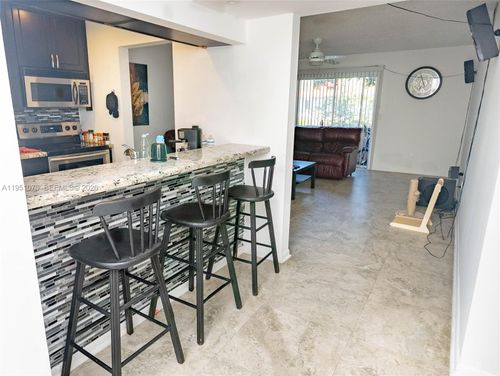 7-203-10772 La Placida Dr, Coral Springs, FL, 33065-3796 | Card Image