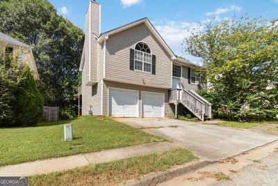 6396 Stonebridge Creek Lane, House other with 3 bedrooms, 2 bathrooms and 2 parking in Lithonia GA | Image 2