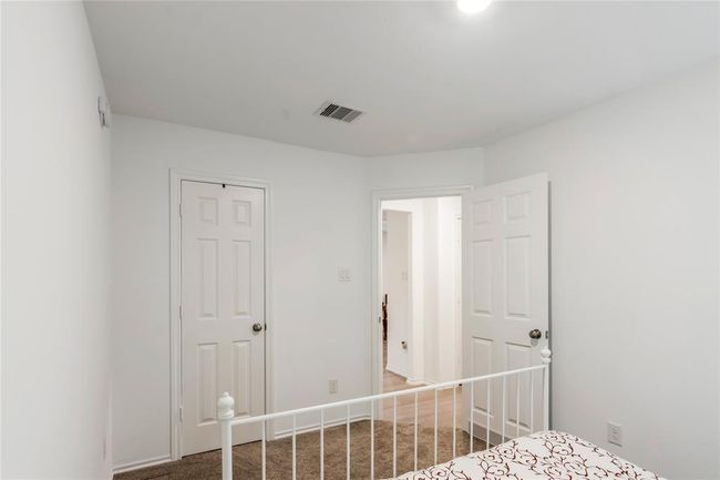 Alternate view of the second bedroom, with great light and closet space. | Image 17