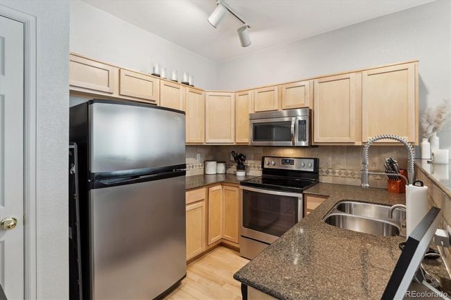 4733 Flower St, Condo with 2 bedrooms, 2 bathrooms and 1 parking in Wheat Ridge CO | Image 4