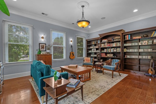 Sitting room with hardwood / wood-style flooring, ornamental molding, and recessed lighting | Image 9