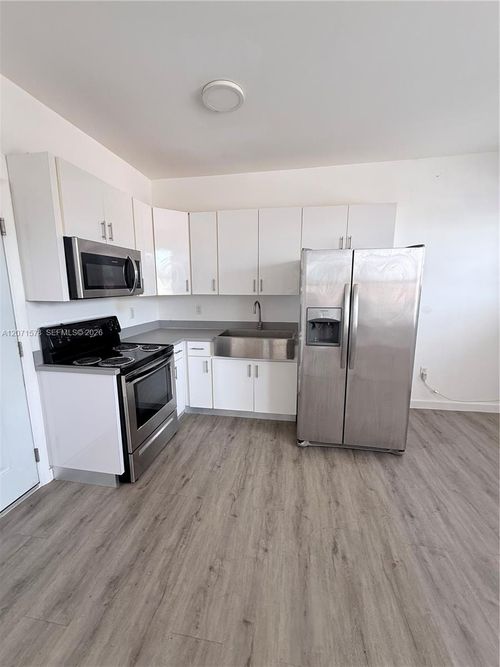 213-402 Nw 12th Ave, Miami, FL, 33128-1065 | Card Image