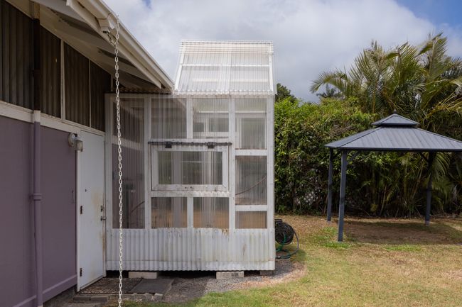 Greenhouse attached to the back of the house, along with gazebo. | Image 14