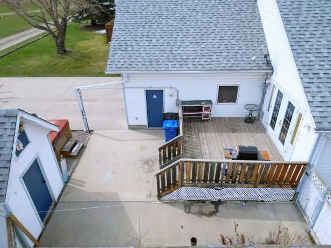 401 Slade Place, Home with 3 bedrooms, 2 bathrooms and 4 parking in Nanton AB | Image 28
