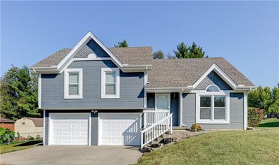 View of front of house and 2 car garage | Image 1