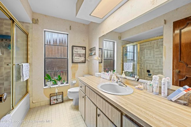 8268 Garrison St, House other with 3 bedrooms, 3 bathrooms and null parking in Spring Hill FL | Image 41