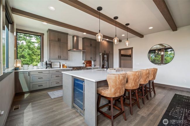 Pull up to the bar and chat with the cook or help chop, dice or slice - and look at that handy beverage fridge. | Image 6