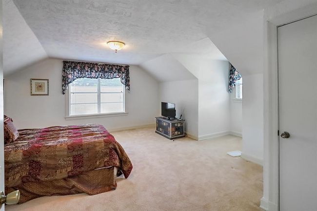 The two upstairs bedrooms are super spacious! | Image 25
