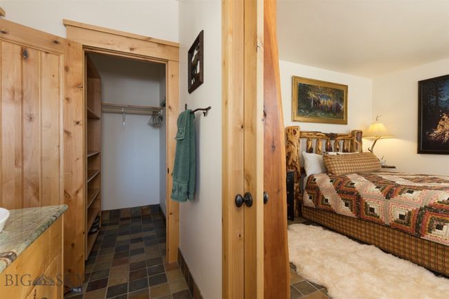 Entry level Bedroom 2 and ensuite bathroom. | Image 57