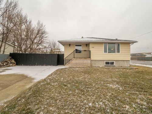 1106 41 Avenue N, Home with 4 bedrooms, 2 bathrooms and 5 parking in Lethbridge AB | Card Image