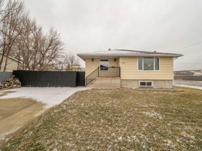 1106 41 Avenue N, Home with 4 bedrooms, 2 bathrooms and 5 parking in Lethbridge AB | Image 1