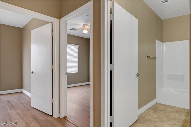 Hall featuring baseboards and luxury vinyl plank flooring | Image 19