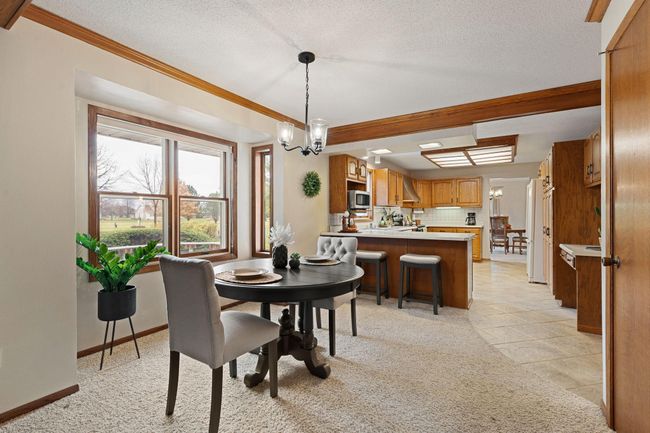 View of Dining adjacent to Kitchen | Image 14
