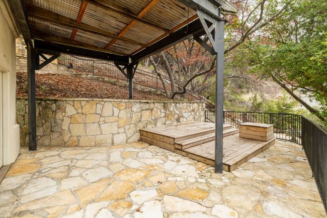 Wonderful Patio area out side of downstairs room. Use your imagination to make your spacial space. | Image 25