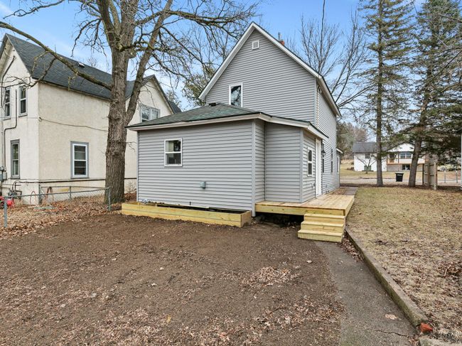 An updated back deck and flower box add to the curb appeal of this home. | Image 26