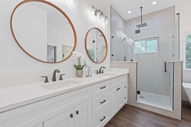 Bathroom featuring double vanity, a shower | Image 26