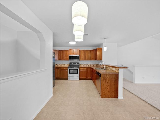 UNIT-307 - 10818 Cimarron St, House attached with 2 bedrooms, 2 bathrooms and null parking in Firestone CO | Image 20