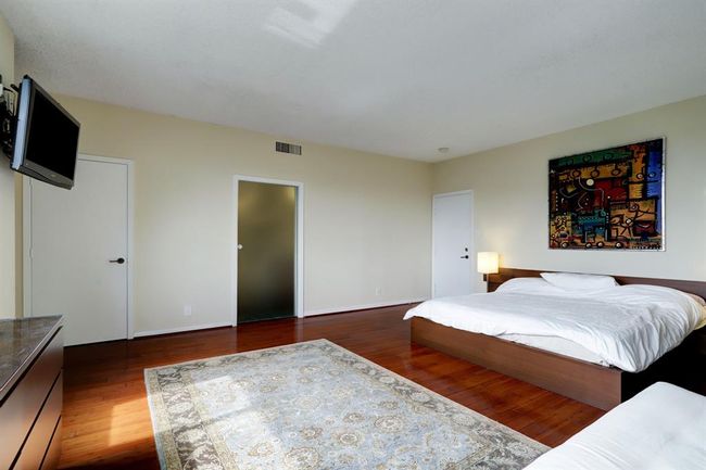 Primary Bedroom features large walk-in closet and ensuite remodeled bath | Image 11