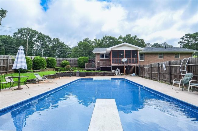 879 Old Tucker Rd, House other with 3 bedrooms, 2 bathrooms and 2 parking in Stone Mountain GA | Image 4